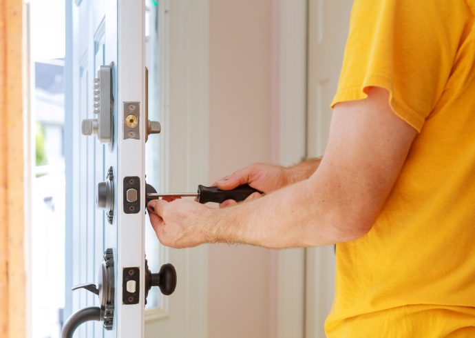 worker-installing-or-repairing-new-lock-handyman-repair-the-door-lock-1.jpg